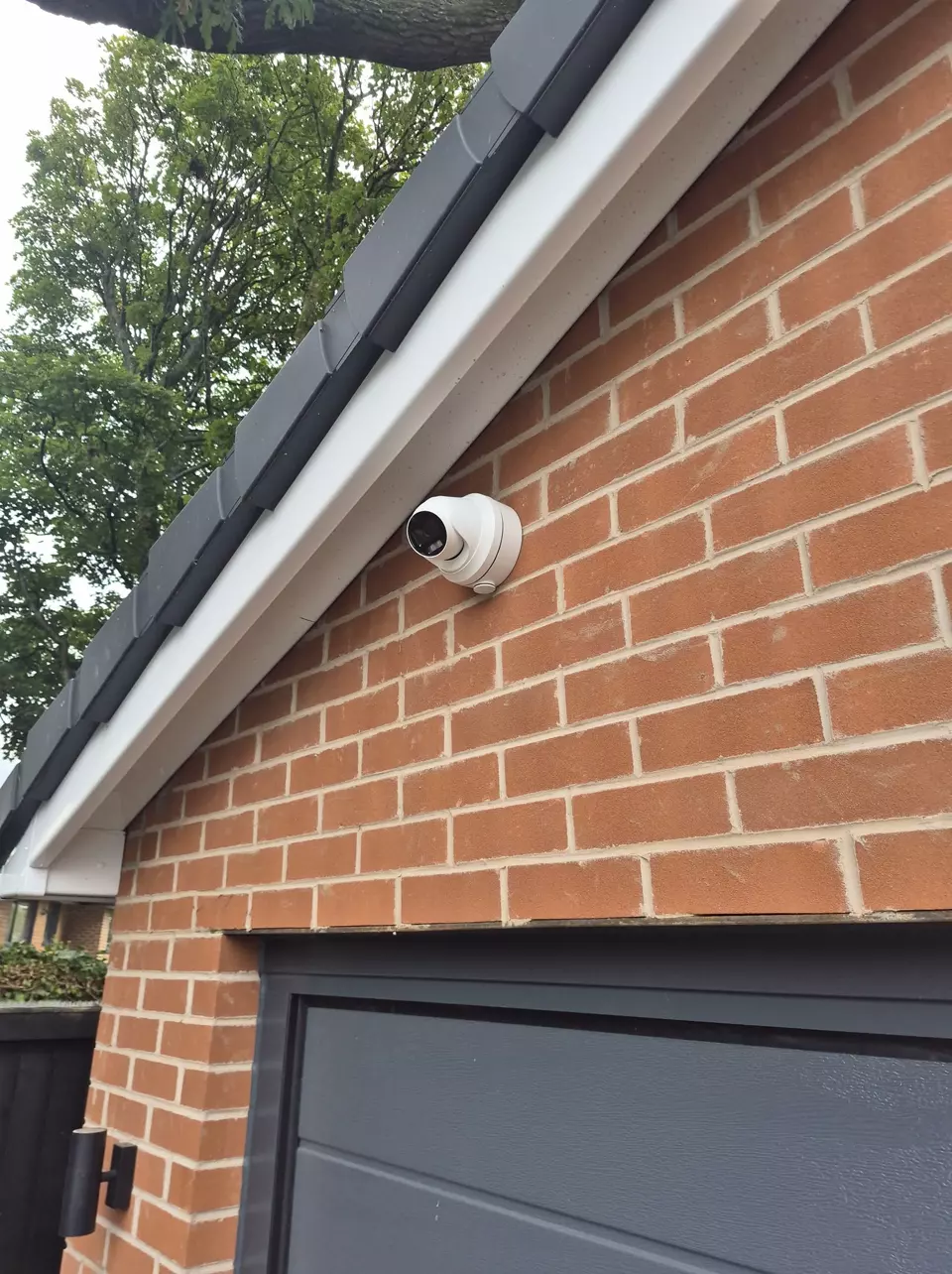 Camera covering the drive and garage door.
