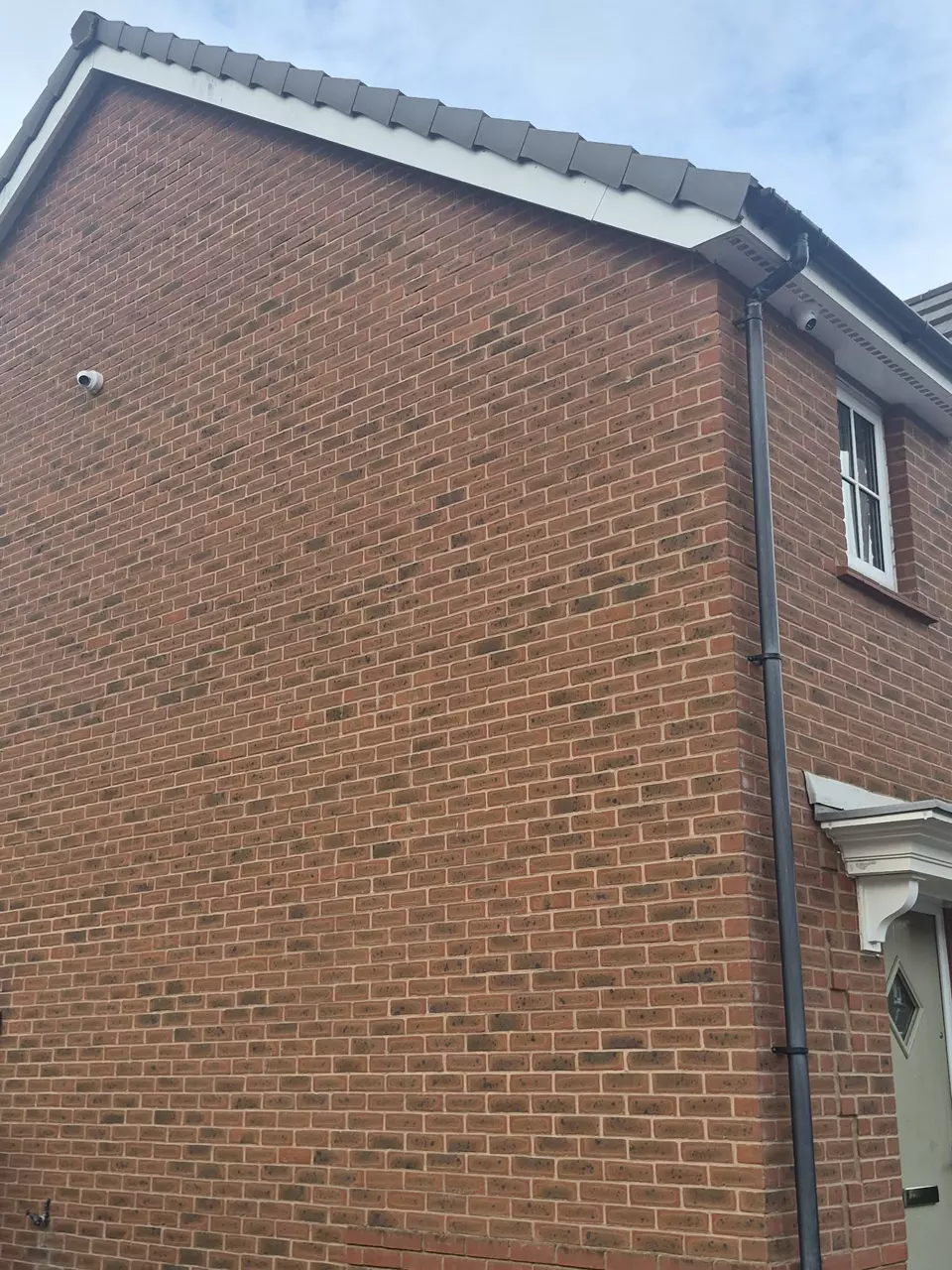 Camera on the gable end, watching the side of the house.